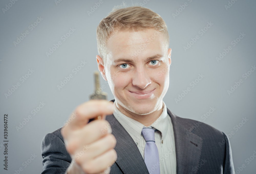 man businessman realtor offering keys studio isolated man businessman realtor offering keys studio isolated
