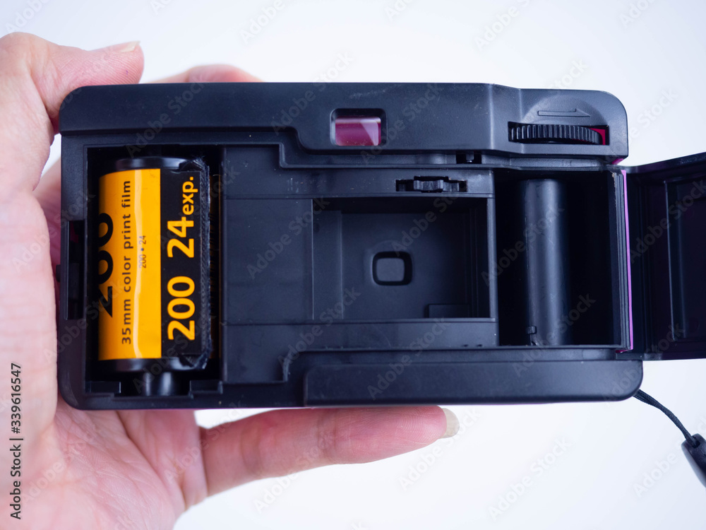 Photo film on camera isolated on white backgound Photo film on camera isolated on white backgound