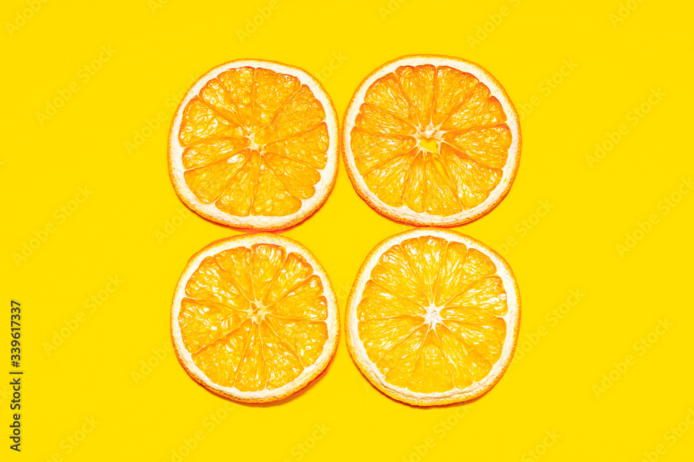Pattern with orange dried orange slices, four pieces. Pattern with orange dried orange slices, four pieces.