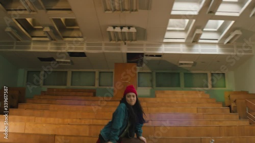 girl dancing in the lacture hall photo