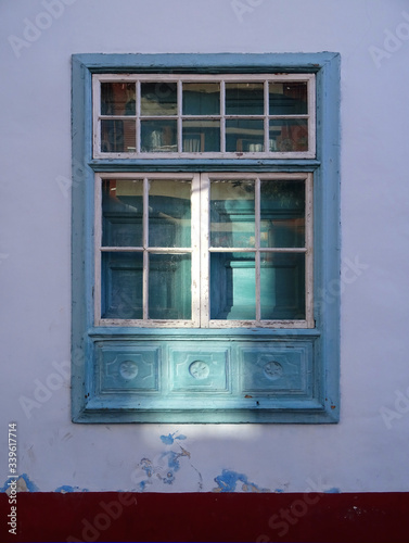 Traditional guillotine window in historic colonial house. Old city center of Santa Cruz. La Palma Island. Canary Islands. Spain. 