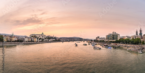 Colorful sunset over the Banks of the River Danube, in Budapest, capital city of Hungary © FarkasB