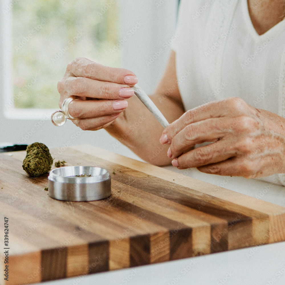 Woman using medical marijuana Woman using medical marijuana