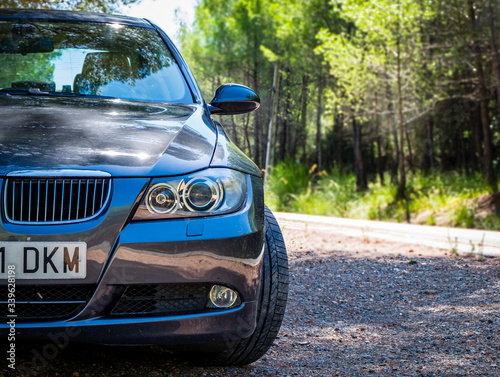 AUGUST 2017: BMW 3 series E90 330i Sparkling Graphite luxury car. © alzamu79