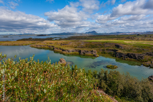 Lake Mývatn is a lake in the northeast of Iceland. There is blue-hued water, which is characterised by high clarity.