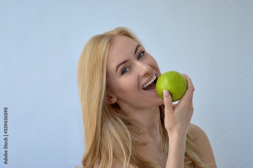 young woman with green apple