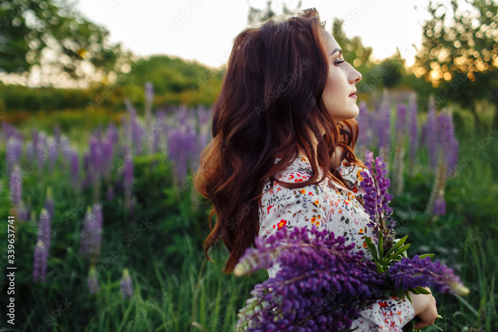 Beautiful girl walking on the street in spring. Young woman enjoying spring weather weather. Beautiful girl walking on the street in spring. Young woman enjoying spring weather weather.