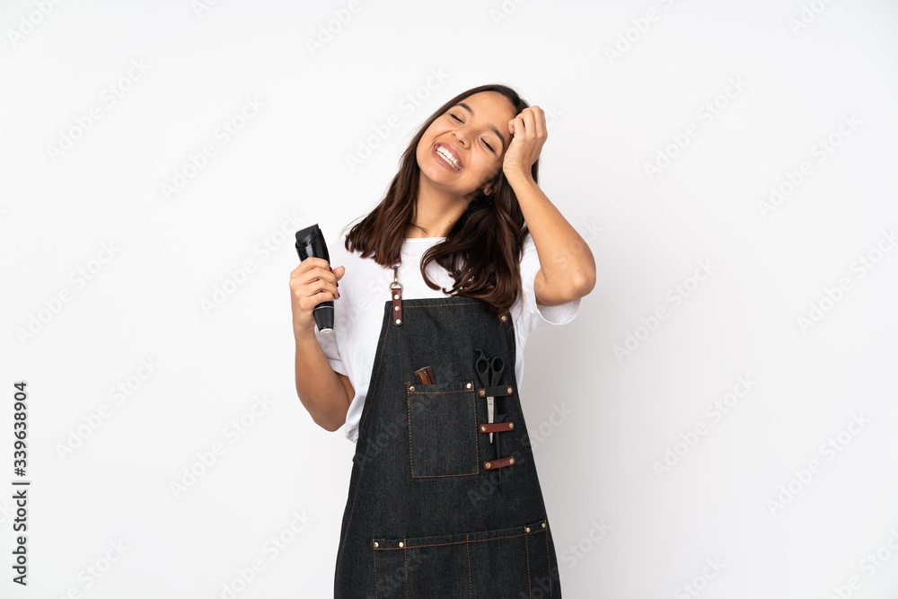 Young hairdresser woman isolated on white background smiling a lot Young hairdresser woman isolated on white background smiling a lot