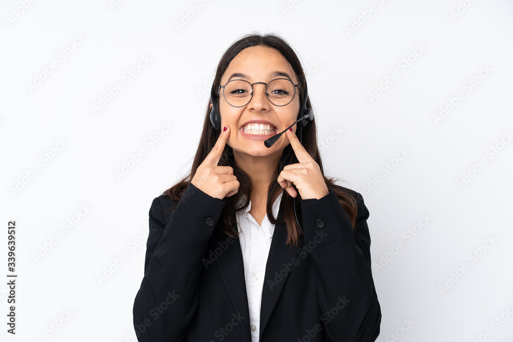 Young telemarketer woman isolated on white background smiling with a happy and pleasant expression Young telemarketer woman isolated on white background smiling with a happy and pleasant expression