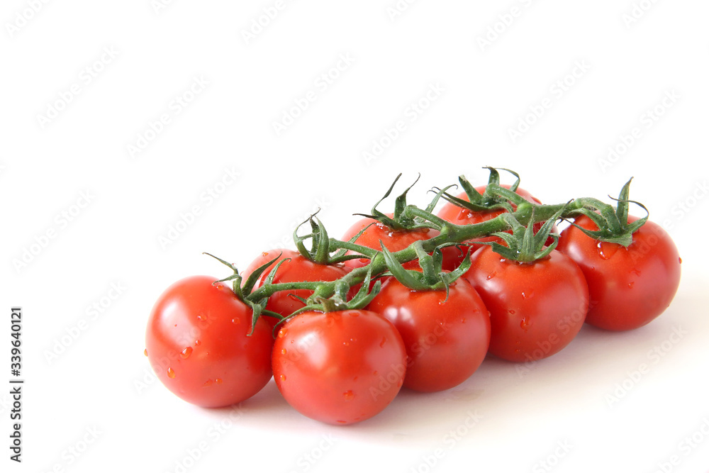 Mini panicle tomatoes on white background