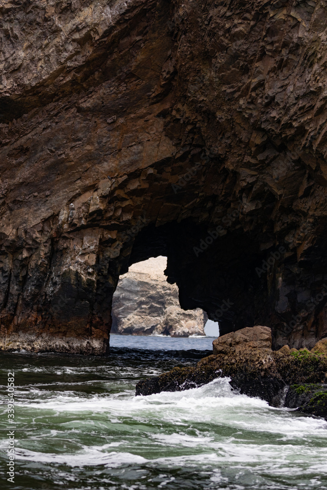 Cave in the island on the National seal reserve in Pisco, Peru