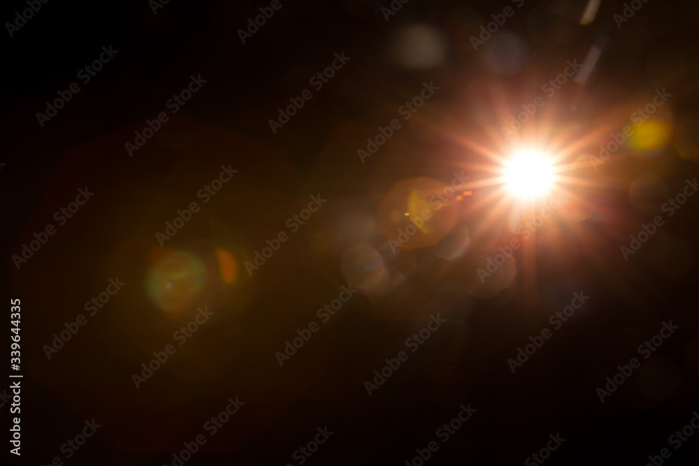 Abstract Natural Sun flare on the black background. Abstract Natural Sun flare on the black background.