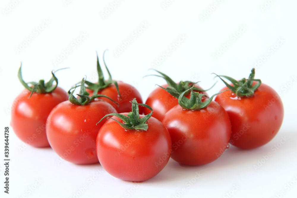 Mini panicle tomatoes on white background Mini panicle tomatoes on white background