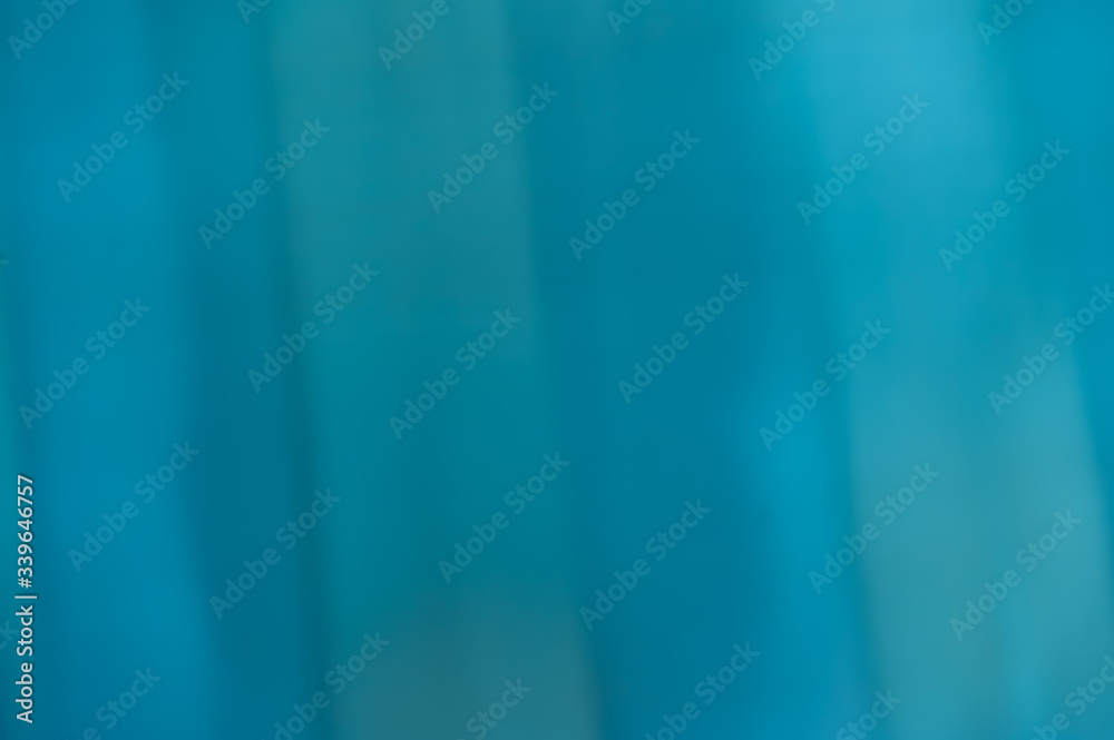 
Abstract blue cyan background with diagonal frequent parallel lines. Monochrome, backdrop, background