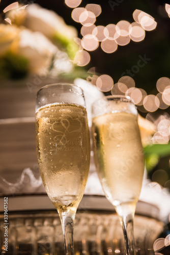 two glasses of champagne for bride and groom photo