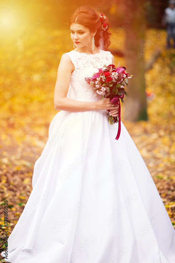 Beautiful bride outdoors in a forest. Wedding day