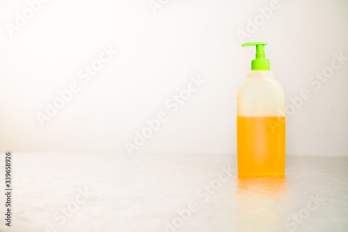 antibacterial soap stands on a light table