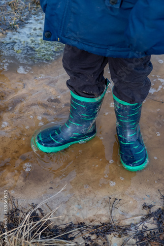 Wallpaper Mural bright rubber boots in a puddle Torontodigital.ca