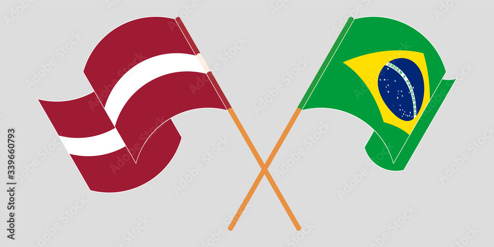 Crossed and waving flags of Latvia and Brazil Crossed and waving flags of Latvia and Brazil