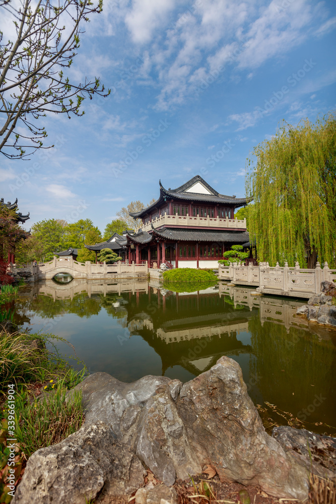 A beautiful spring afternoon view of a Chinese tea house in Luisenpark.