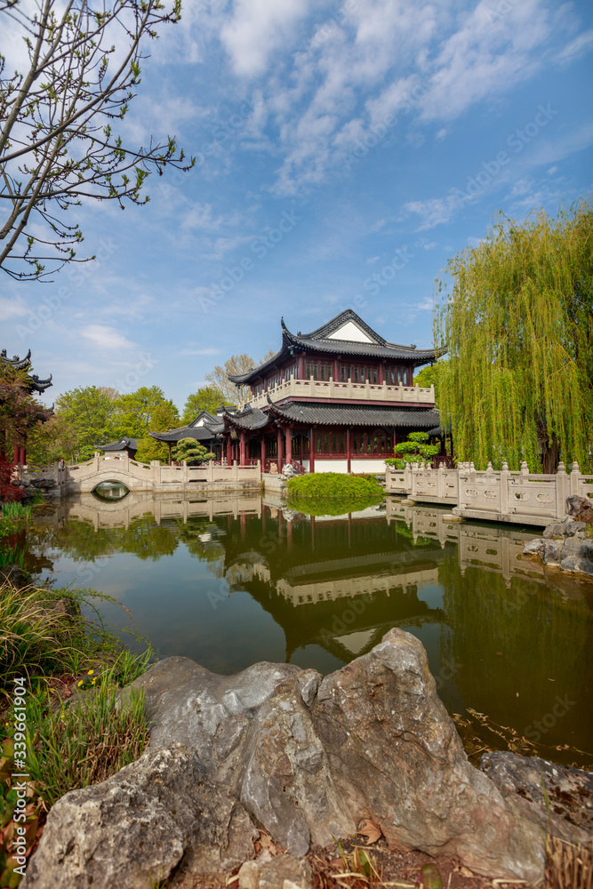 A beautiful spring afternoon view of a Chinese tea house in Luisenpark. A beautiful spring afternoon view of a Chinese tea house in Luisenpark.