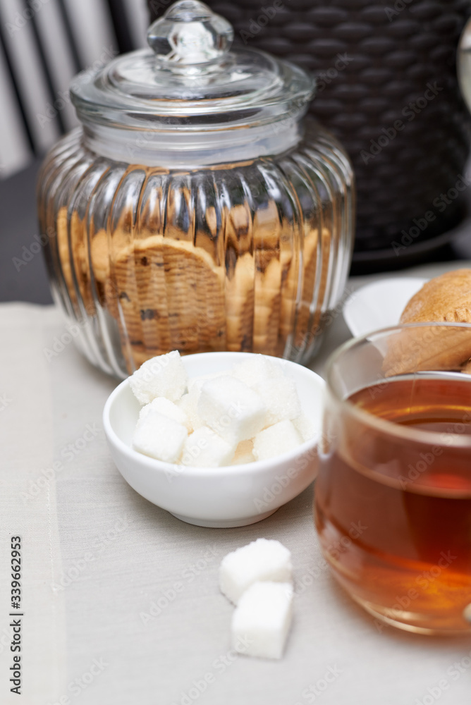tea and sugar cubes, cookies in a jar tea and sugar cubes, cookies in a jar