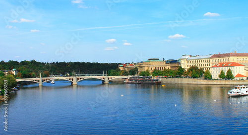 View of the Vltava river with a boat in the summer. Prague. Czech Republic © Irina Anashkevich