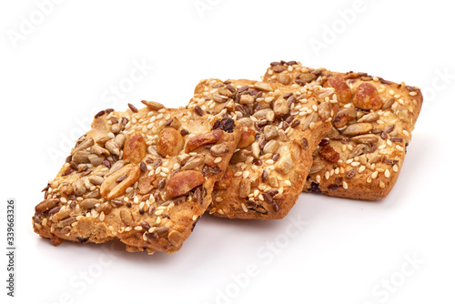 Cookies with nuts and seeds, isolated on white background