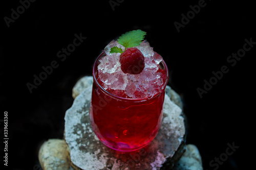 glass of red wine with ice