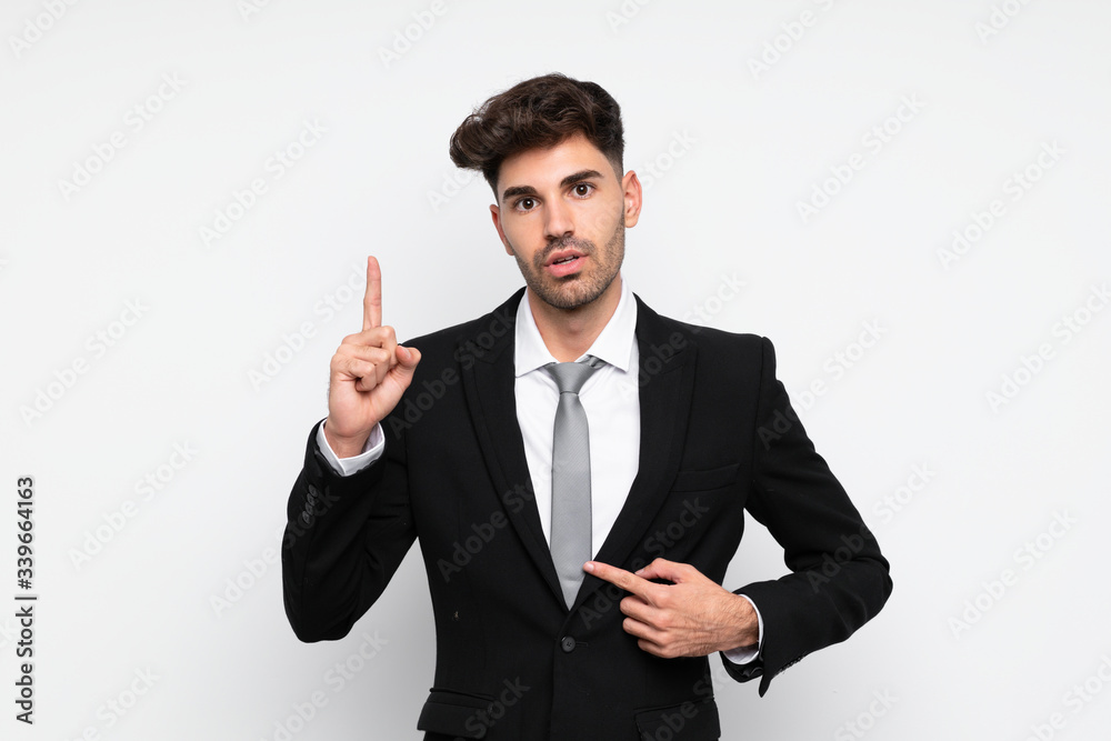 Young businessman over isolated white background with surprise facial expression Young businessman over isolated white background with surprise facial expression