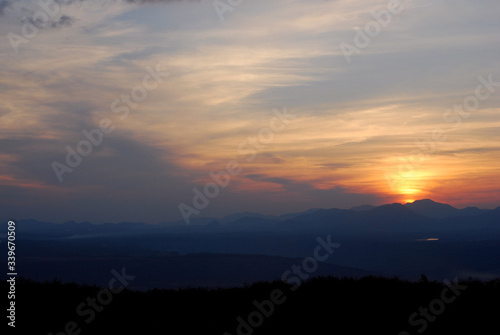 Sunrise among forests and mountains © njmucc