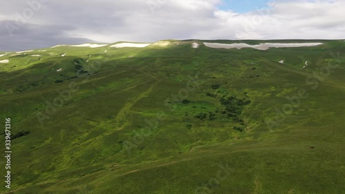 Aerial view, green valley, forest and hills in Adygea. Top View. 