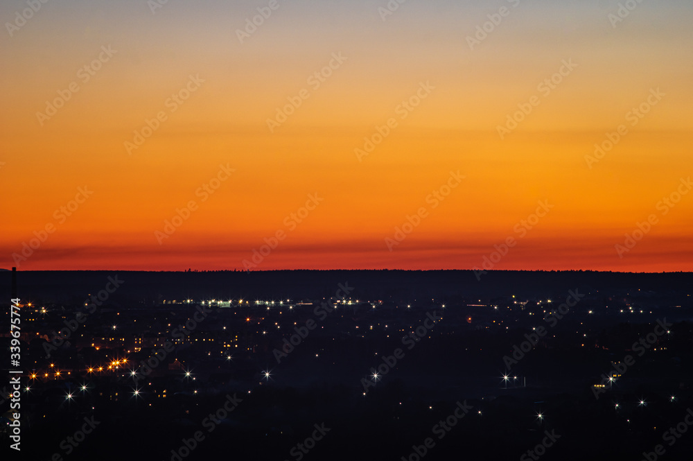 Sunset on the background of the city in spring Sunset on the background of the city in spring