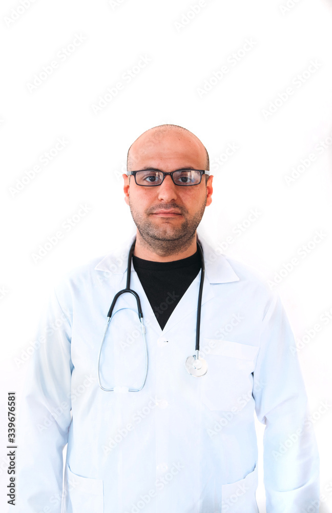 Portrait of a young male doctor in medical mask, sterile gloves and stethoscope while looking at camera on isolated white.