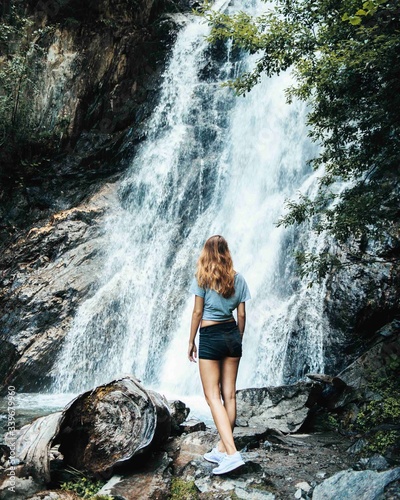Girl at natural waterfall  Austria 