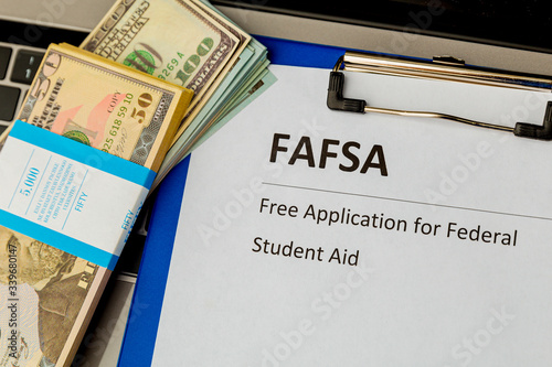 Fafsa. Student aid. Money on the table photo