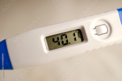 Isolated thermometer showing 40 degrees Celsius. High Temperature. Fever. 