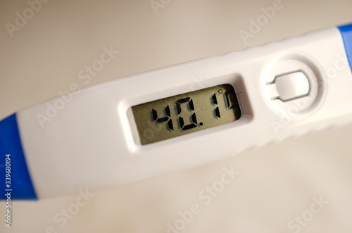 Isolated thermometer showing 40 degrees Celsius. High Temperature. Fever. 