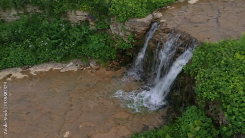 Aerial View, Small waterfall in Adygea mountain, Russia. Top View.