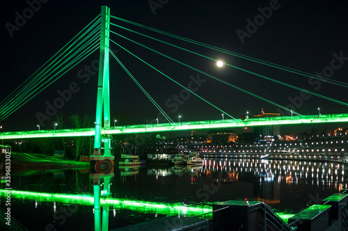 Tyumen, Russia, on April 15, 2020: The pedestrian cable-stayed bridge in Tyumen at night