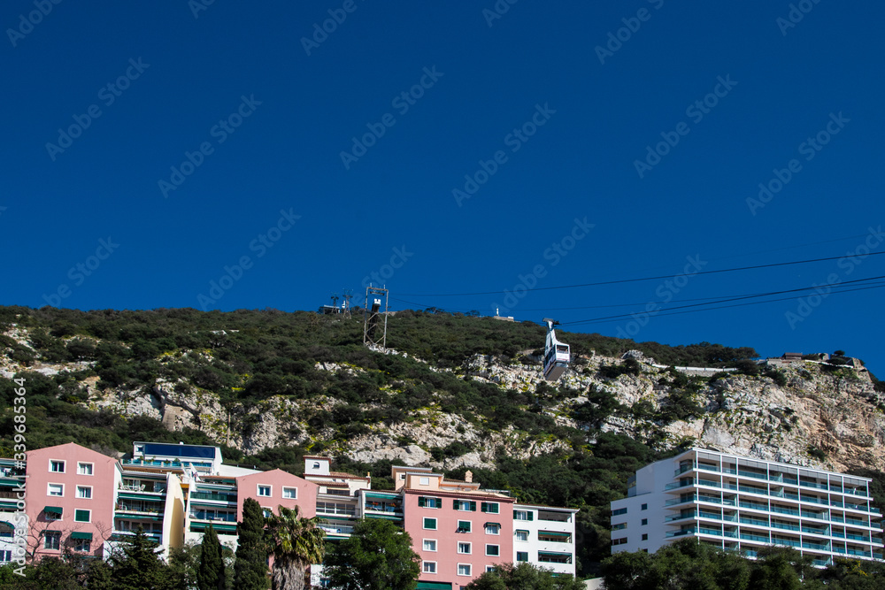 Gibraltar, UK -February 20, 2020. The Cable Car ascending to the top of the Rock of Gibraltar. British Overseas Territory, UK. Gibraltar, UK -February 20, 2020. The Cable Car ascending to the top of the Rock of Gibraltar. British Overseas Territory, UK.