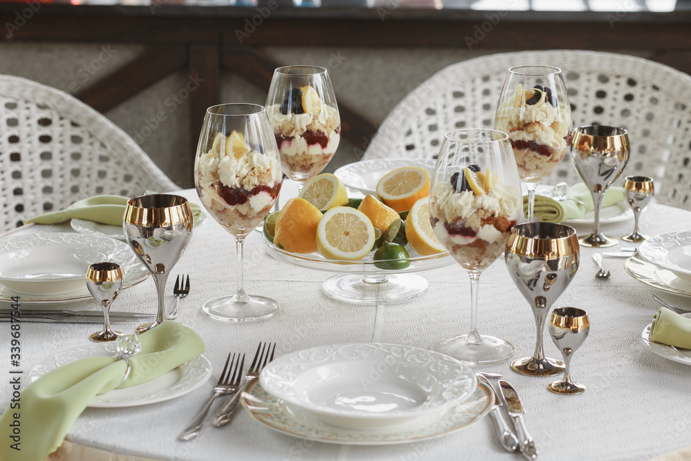Fototapeta premium Table with pastry. Desserts served table
