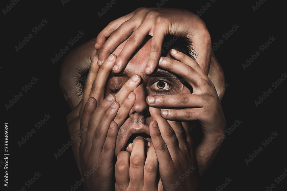 man with hands on face  don't touch your face Stock Photo