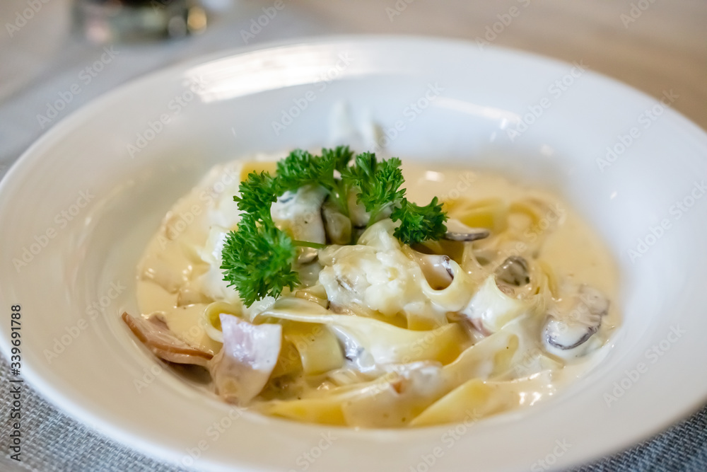 Close-up of fettuccine carbonara ham cheese. Close-up of fettuccine carbonara ham cheese.