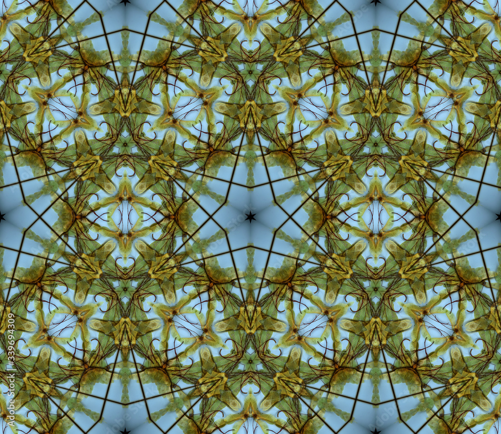 Seamless pattern kaleidoscope: maple seeds, autumn stained glass