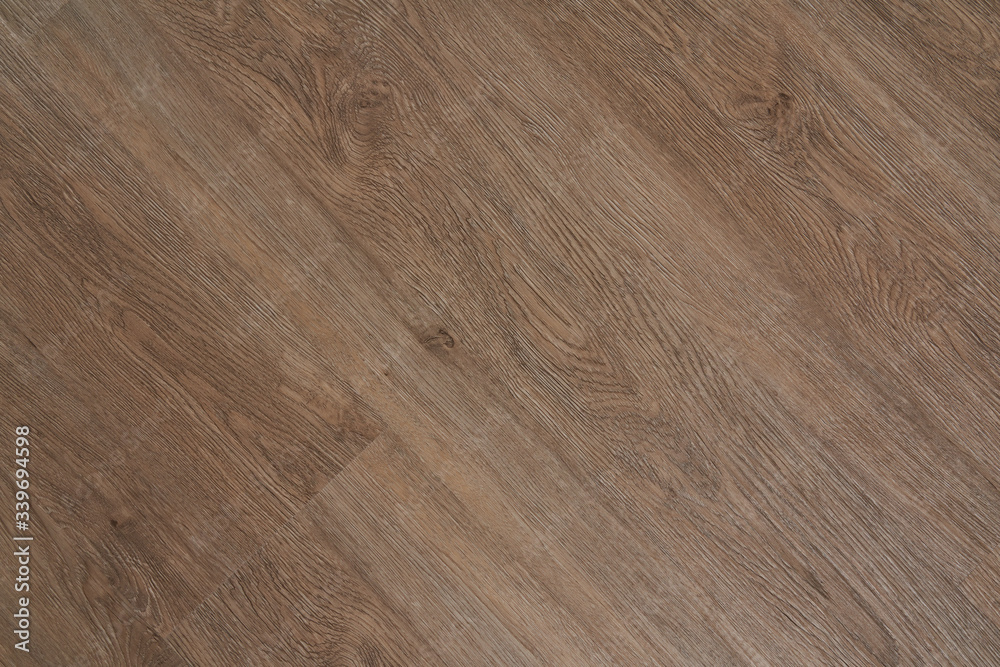 Fototapeta premium New parquet. Oak Wooden laminate floor boards background image.