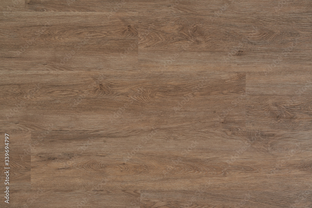 Obraz premium New parquet. Oak Wooden laminate floor boards background image.
