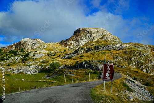 Road sign on panoramic road in National Park Durmitor, Montenegro. © Tsiana