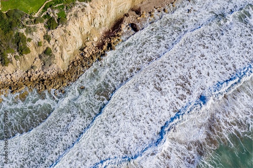 Aerial drone view on waves on stormy weather.