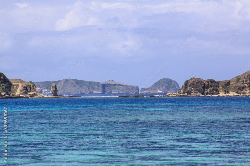 Ocean and rocks at Kuta beach Lombok, Indonesia Ocean and rocks at Kuta beach Lombok, Indonesia